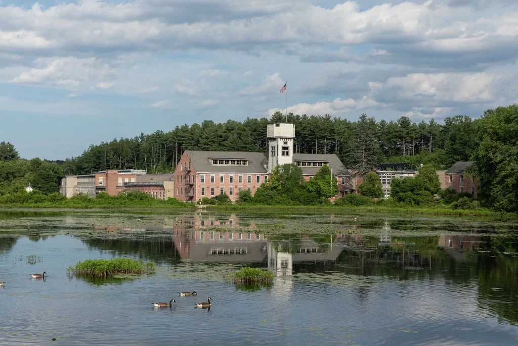 Phoenix Park building across from a large pond in Shirley, Massachusetts.