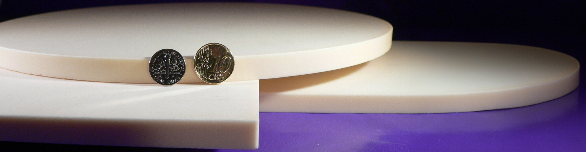 two silver coins side by side